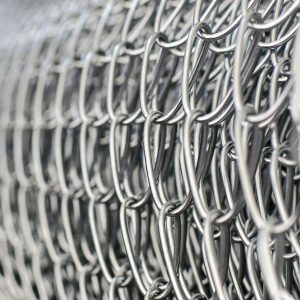Close,Up,Of,Wire,Mesh,Fence,In,Roll