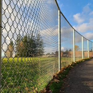 Empty,Road,Beside,Mesh,Fence,In,Elementary,School,Area,,Wide